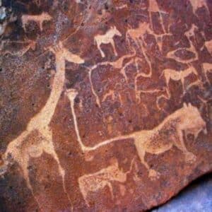 pintura rupestre com leões e girafas História da arte africana